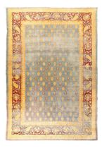 An Indian Amritsar carpet, last quarter 19th century, the central field with repeating paisley mo...