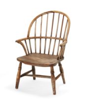 An English ash and elm child's Windsor chair, 19th century, 57cm high  Provenance: Property from...