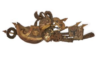 A North European polychrome and giltwood military cresting, 19th century, carved with a plumed he...