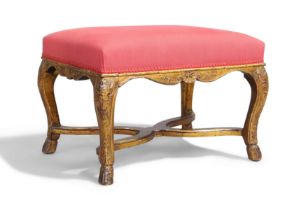 A Louis XV giltwood stool, third quarter 18th century, the carved frame on cabriole legs to hoof ...