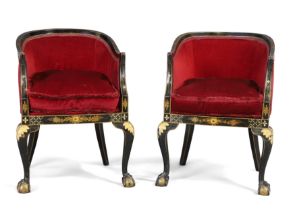 A pair of English japanned tub chairs, first quarter 20th century, red velour upholstery, on cabr...