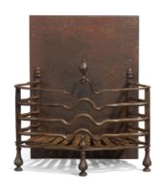 An English wrought iron fire-grate, in the Dutch style, late 19th century, the serpentine railed ...