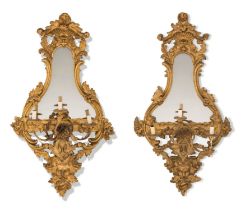A pair of early Victorian gilt composition three-light girandoles, mid-19th century, the replaced...