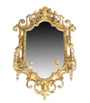 A large French giltwood and gesso girandole, third quarter 19th century, the shaped moulded frame...