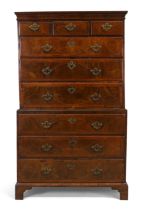 A George II inlaid walnut chest on chest, second quarter 18th century, cross and feather banded, ...