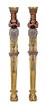 A pair of Italian giltwood polychrome decorated figural pilasters, 19th century, each in the form...