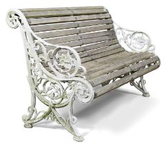 A late Victorian white-painted cast-iron garden seat, late 19th / early 20th century century, the...