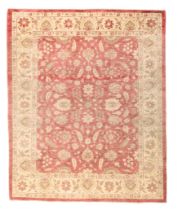 A Zeigler carpet, last quarter 20th century, floral design on a red and cream ground, 303 x 248cm...