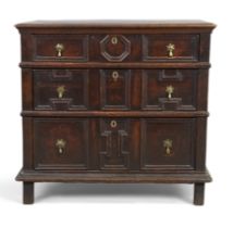 A Charles II oak chest, last quarter 17th century, the rectangular top above three graduated draw...