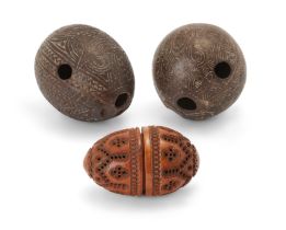 A carved and pierced coquilla nut pomander, 19th century, of ovoid form, screw-thread opening, 7....