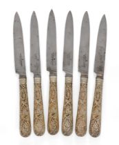 A set of six Victorian dessert knives with silver gilt Vine pattern handles.  William Theobalds ...