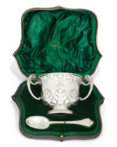 An Edwardian silver christening set.  Wakely & Wheeler,  London, 1909.  The set comprising a s...