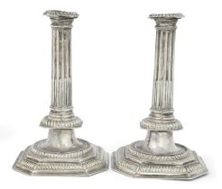 A pair of William III silver candlesticks.  Maker's mark 'DB' with mullet or pellet above.  Lon...