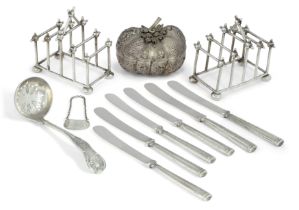 Two Edwardian silver four division toast racks.  S. W. Smith & Co.,  London, 1907.  Of angular...