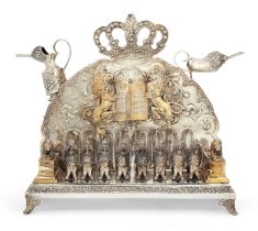 A German parcel gilt silver Hanukkah oil menorah.  Late 19th/early 20th century.  Stamped 900. ...