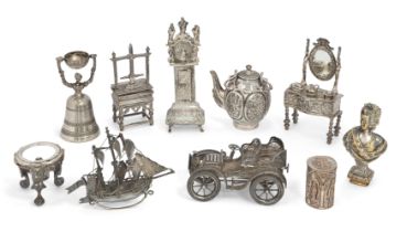 A group of novelty Continental miniature models.  Various dates and makers.  Silver and white m...