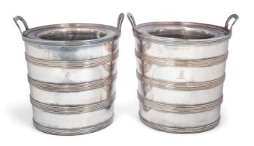 A pair of Georgian Old Sheffield Plate barrel-shaped wine coolers.  c.1810.  Designed with reed...
