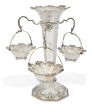 An Edwardian silver epergne with three hanging baskets.  William Comyns & Sons,  London, 1906. ...