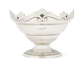 An Edwardian silver footed dish with shaped rim.  Walker & Hall,  Sheffield, 1908.  Of circula...