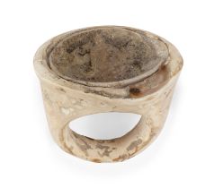 To Be Sold With No Reserve A Hellenistic bone finger ring, circa 2nd Century B.C., with broad ...