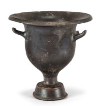 A Greek black glazed pottery bell krater South Italy, circa 4th Century B.C. on a raised hollow...