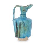 To Be Sold With No Reserve A turquoise blue glazed ewer Central Iran, 12th century On short st...
