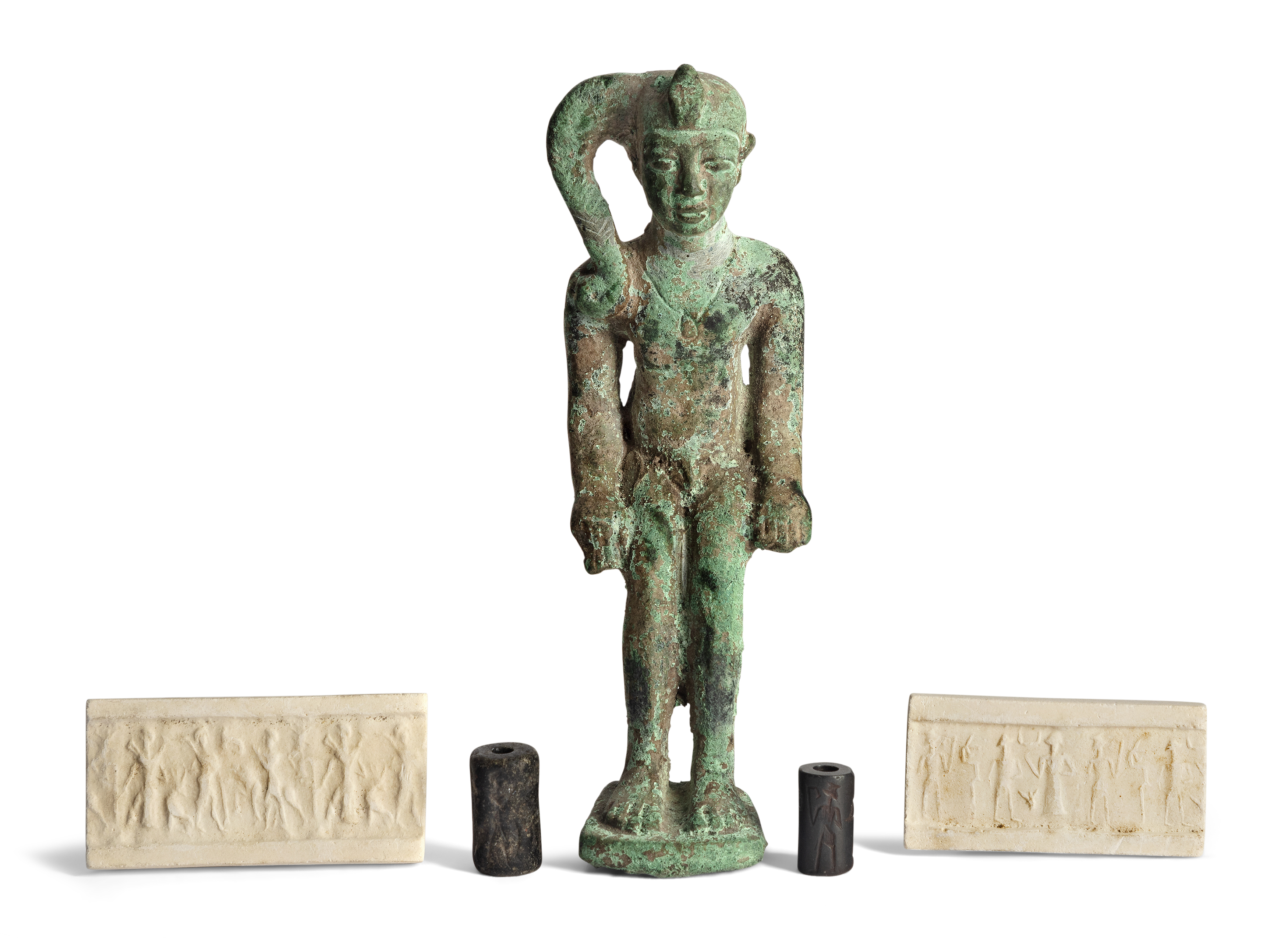 Two ancient near Eastern seals and an Egyptian bronze figure of Horus, the seals possibly re-cut...