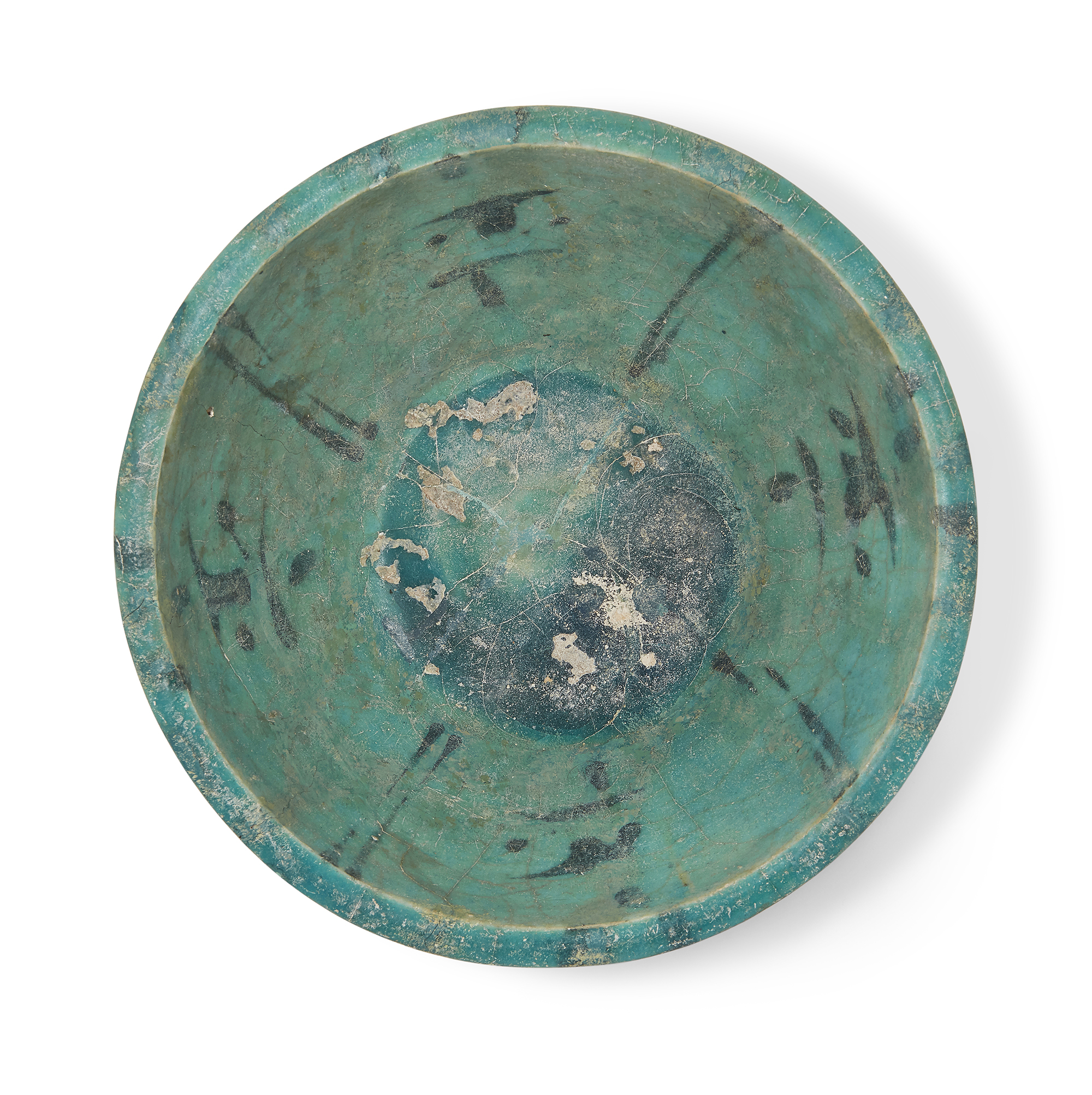 An intact Kashan turquoise glazed bowl, Iran, 13th century, Of deep, conical form, with radiati...