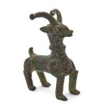 A small copper alloy figure of a deer, Khorasan, northeast Iran, 12th century, Its antlers and ...