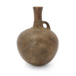 A large intact Amlash grey pottery flask, North Iran, late 2nd – mid 1st Millennium B.C. of glo...