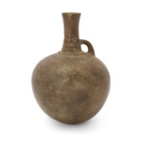 A large intact Amlash grey pottery flask, North Iran, late 2nd – mid 1st Millennium B.C. of glo...