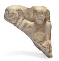 An Egyptian fragmentary limestone pair statue of a man and a woman, possibly New Kingdom, early ...