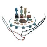 A miscellaneous group of Egyptian style objects Including carnelian, faience and Egyptian Blue b...