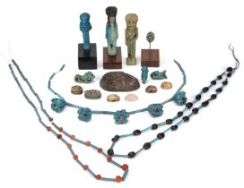 A miscellaneous group of Egyptian style objects Including carnelian, faience and Egyptian Blue b...