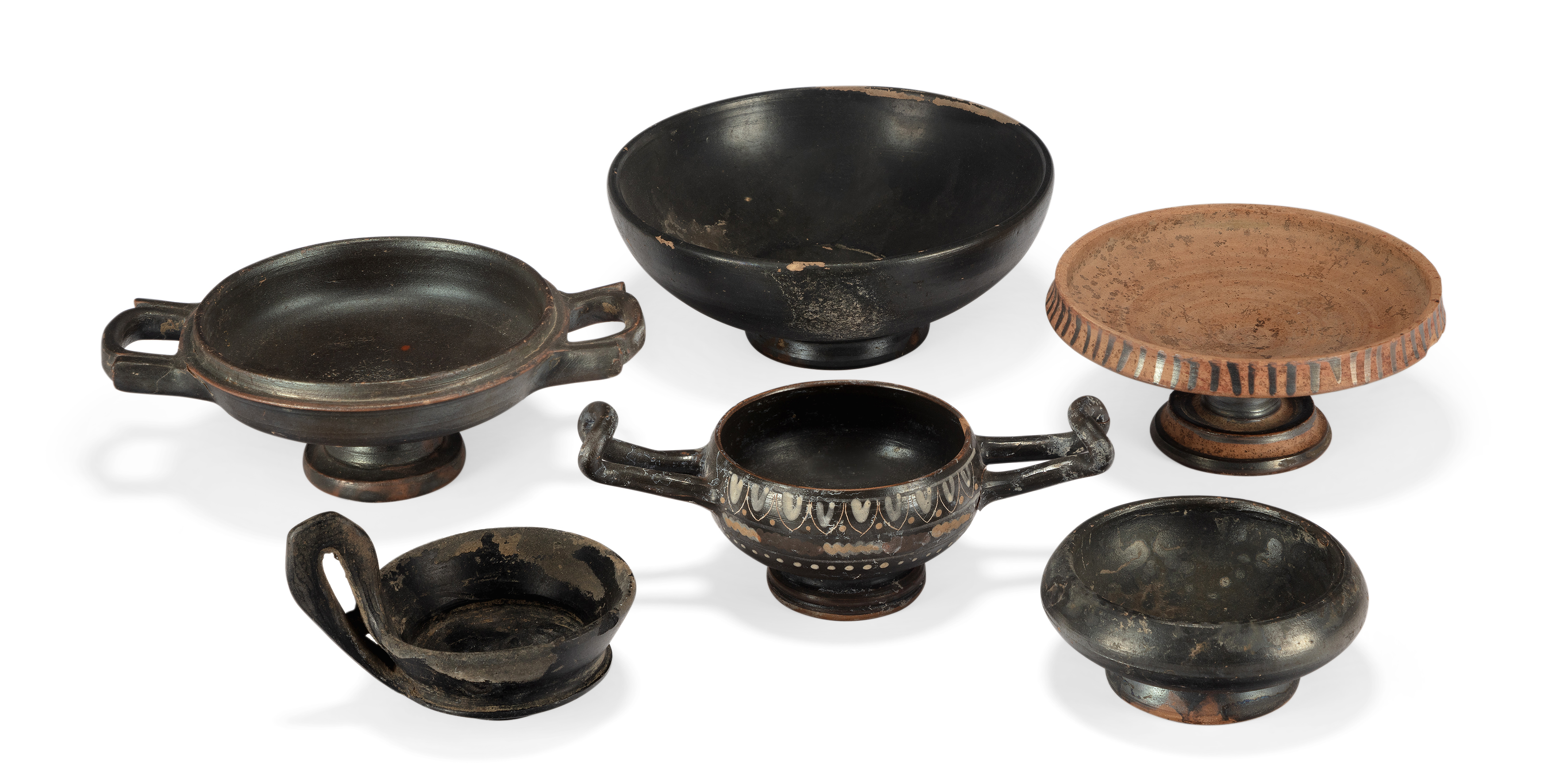 Five Greek South Italian pottery vessels, Circa 4th Century B.C including a miniature Gnathian ...