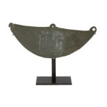 To Be Sold with No Reserve An Egyptian greywacke cosmetic palette in the form of a bird or styli...