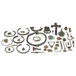 A miscellaneous group of ancient to medieval bronze and lead items, Including the escutcheon of ...
