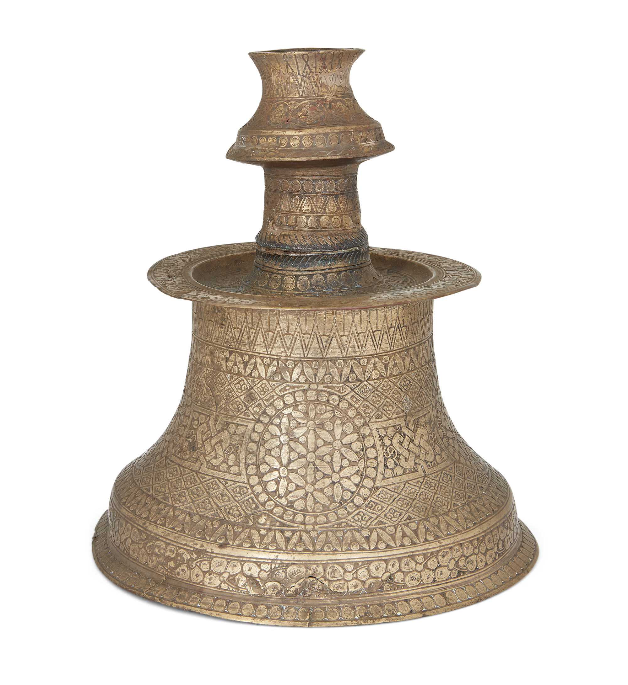 To Be Sold With No Reserve An engraved silver-inlaid brass candlestand, possibly Turkish provinc...