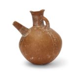 An intact Amlash orange-brown pottery flask, North Iran, late 2nd-early 1st Millennium B.C., wi...