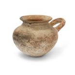 An intact Amlash orange-brown pottery vessel, North Iran, circa 2nd Millennium B.C. with globul...