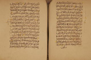 A West African Qur'an, Senegambia, late 19th-early 20th century Arabic manuscript on toned wove...