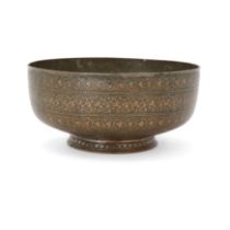 A tinned copper footed bowl, Qajar Iran, 19th century, On short truncated foot, of shallow form...