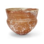 An intact Amlash reddish-orange pottery carinated bowl, Northern Iran, circa 1st Millennium B.C....