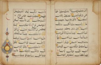 A detached Qur'an bifolio India, circa 16th century Arabic manuscript on paper, 11ll. of black ...