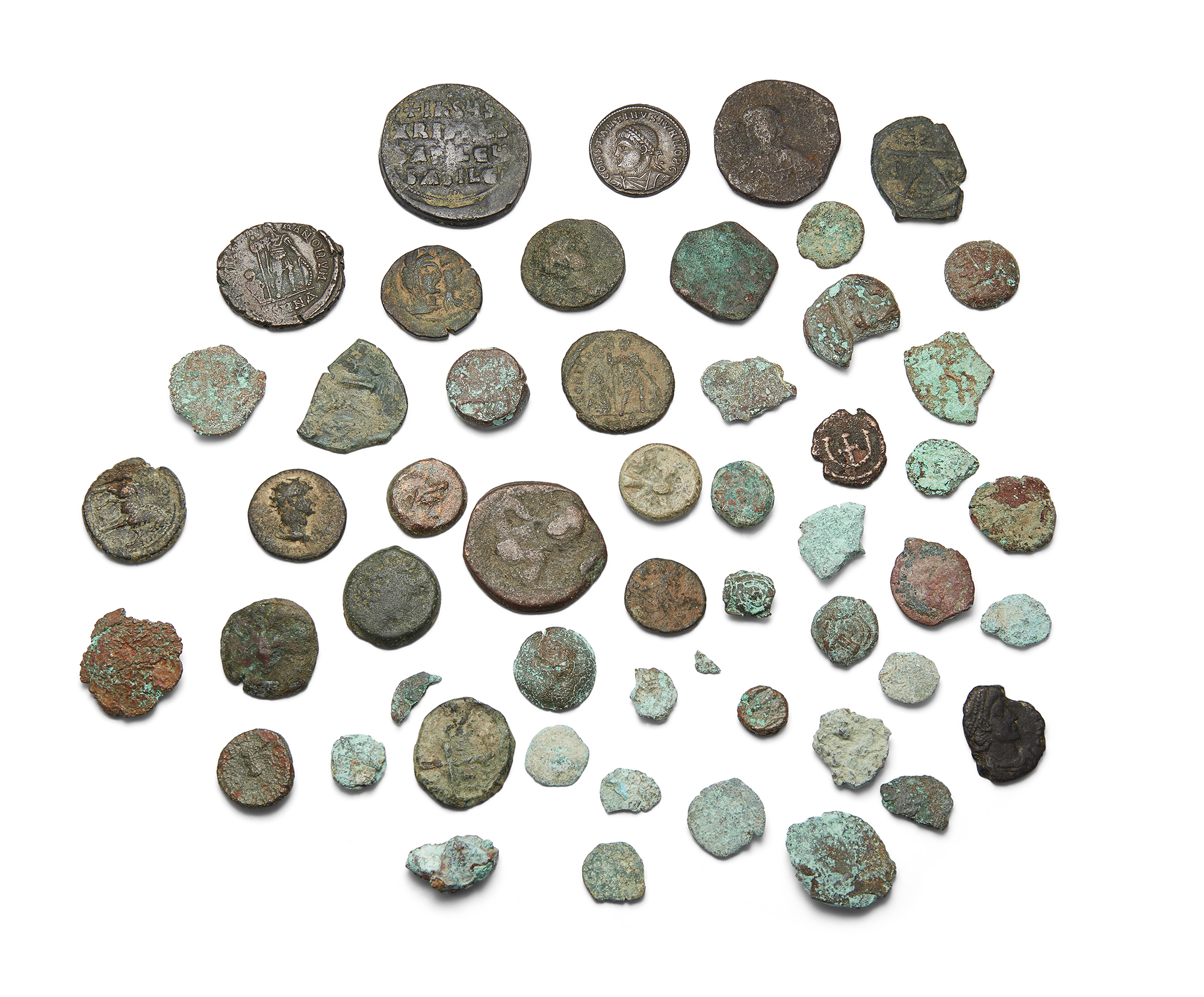 A group of Roman to Byzantine bronze coins, 2nd-10th century AD Provenance: Harold James Strick...