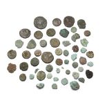 A group of Roman to Byzantine bronze coins, 2nd-10th century AD Provenance: Harold James Strick...
