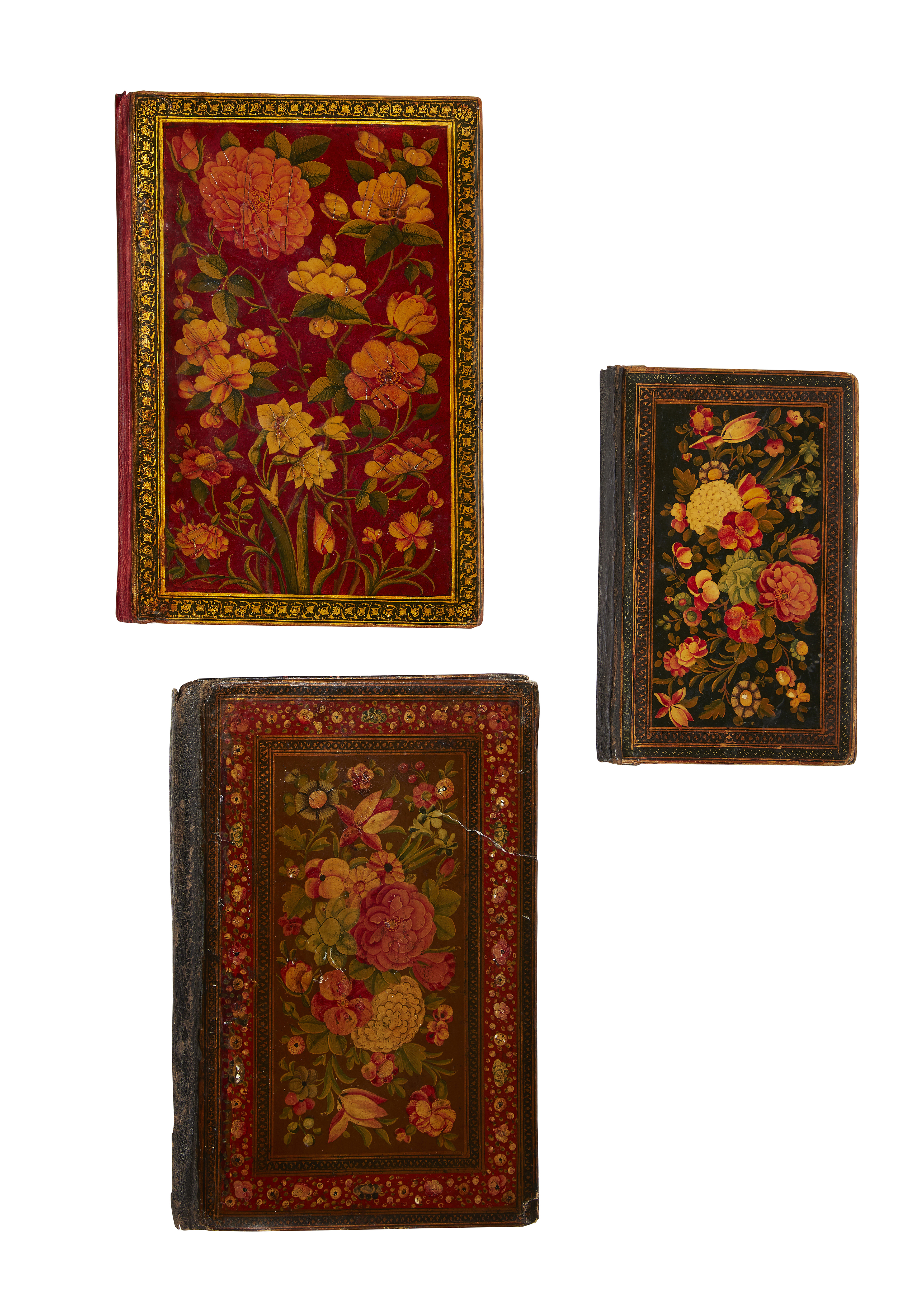 Property from an Important Private Collection Three lacquered papier mache bindings Qajar Iran,...