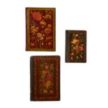 Property from an Important Private Collection Three lacquered papier mache bindings Qajar Iran,...