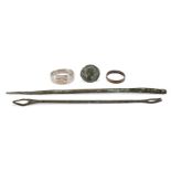 A group of Roman bronze items Comprising a Roman bronze pin, 14.5cm long; a bronze ring, 2cm dia...