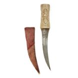 A walrus ivory hilted dagger, Qajar, Iran, 19th century, The double fullered curved blade engra...